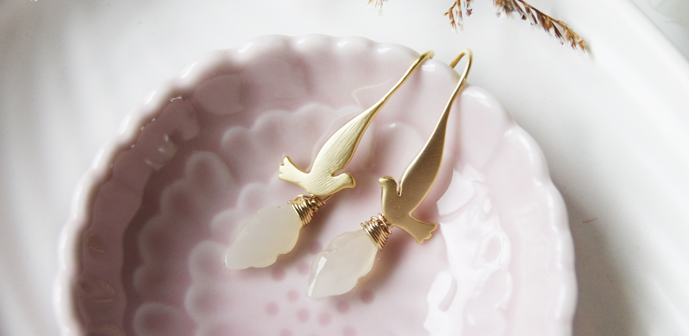 Dove earring with hand-carved moonstone marquise